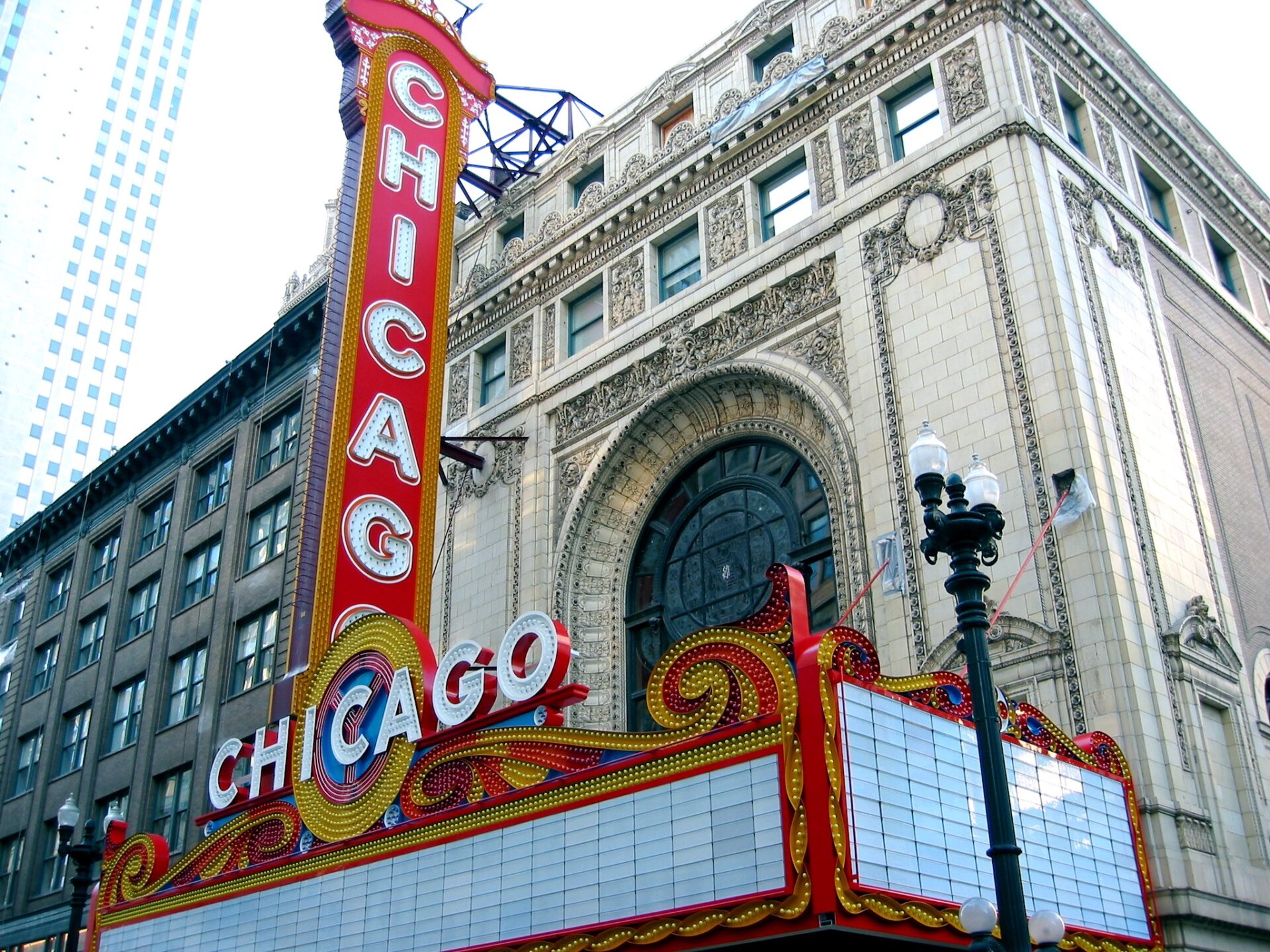 A large chicago theater sign on the side of a building.