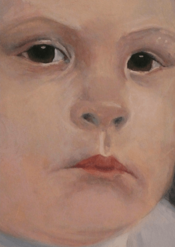 A close up of the face of a child