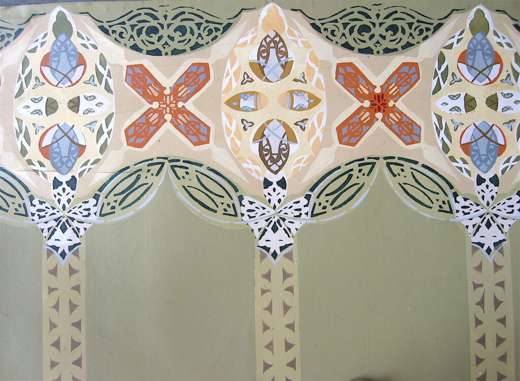 A close up of the ceiling design on a wall